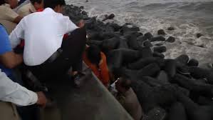 elderly woman slipped and fell into the sea on Marine Drive