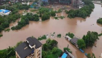 Illegal chawls located on the creek bank in Devichapada